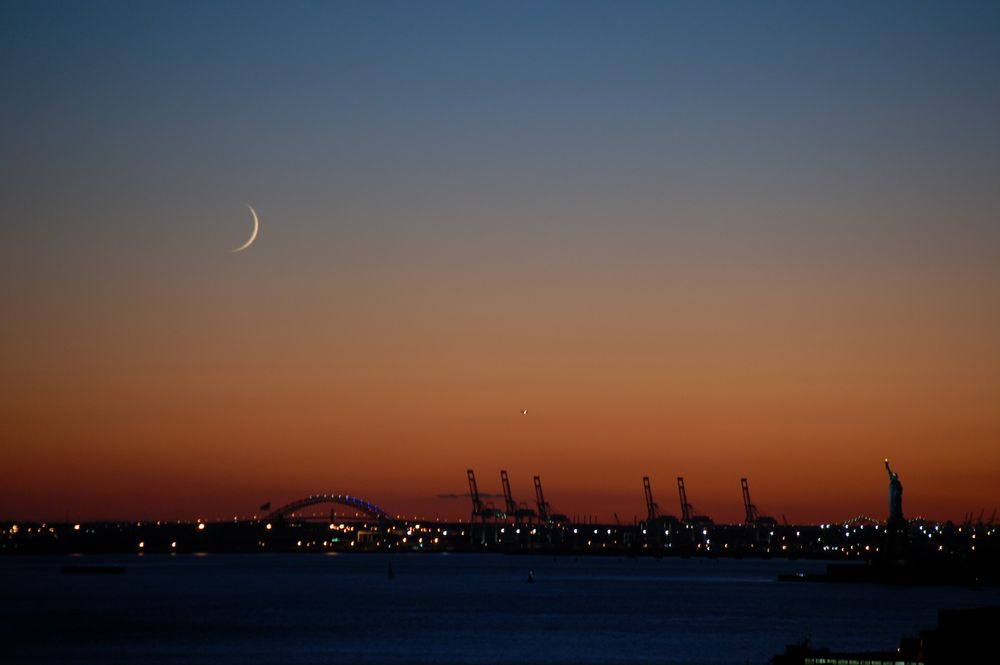 Miss Liberty greeting the moon