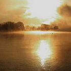 Misty sunrise over river