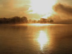 Misty sunrise over river