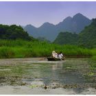 Mit dem Boot durch die idyllische Landschaft von Tam Coc