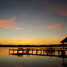 Mit romantischen Farben den Tag am See beginnen.