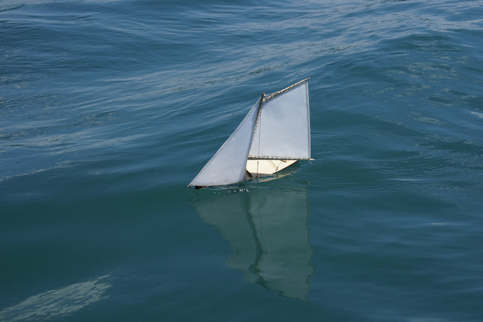 Model sail boat on a cruise