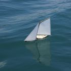 Model sail boat on a cruise