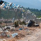 Modern prayer flags at the landfill (rubbish dump) on Samos island, Greece / July 2010