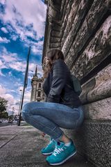 Modern woman lean on wall