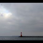 Möwe, Wolkenloch und Leuchtturm