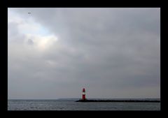 Möwe, Wolkenloch und Leuchtturm