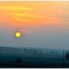 Monduntergang hinter Wolken