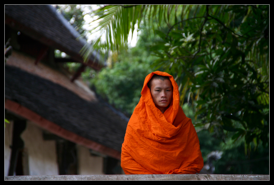 ... monk in a monastery in Luang Prabang ...