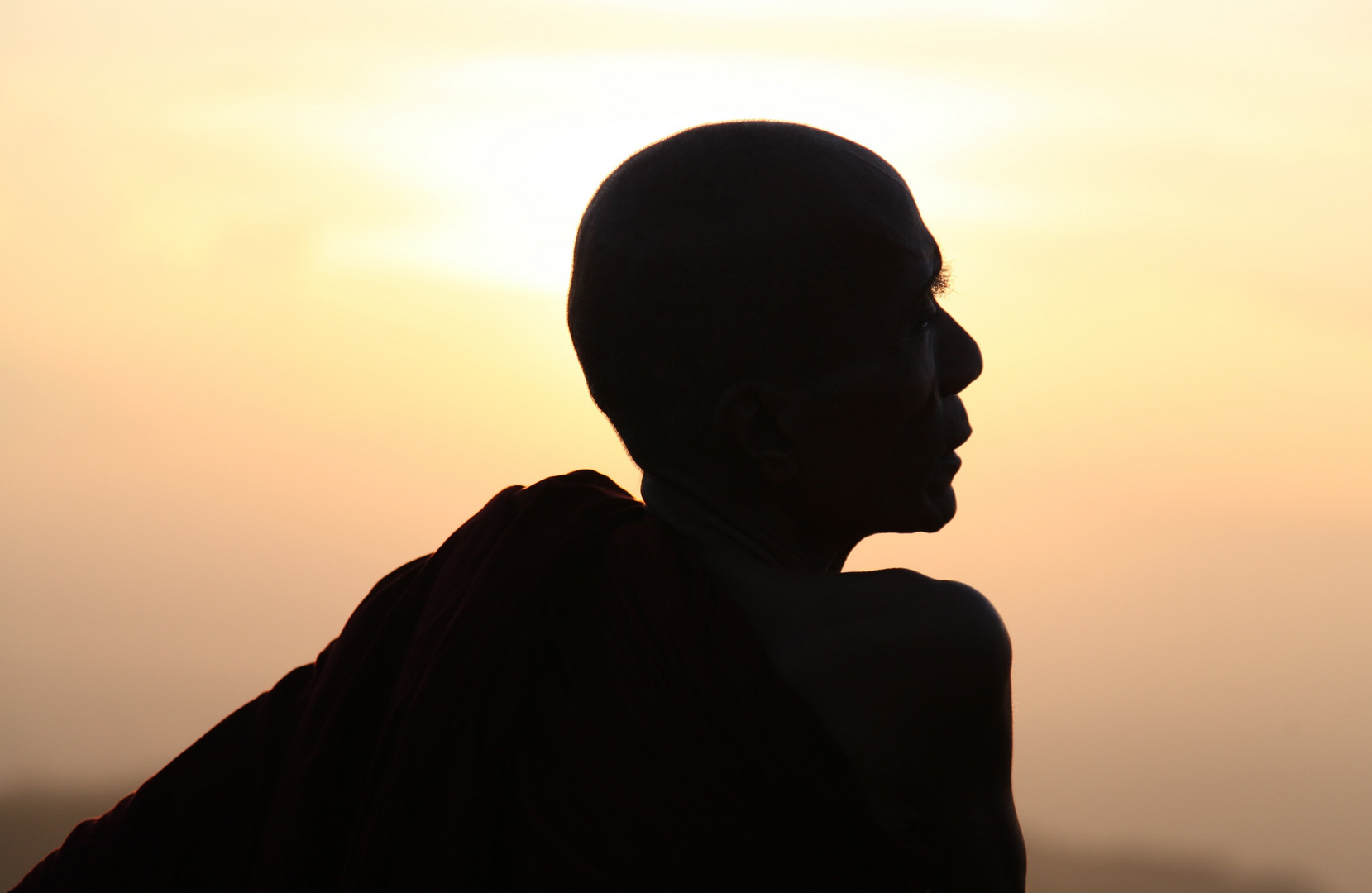 Monk in the sunset