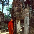 Monk looks to an entrance lintel