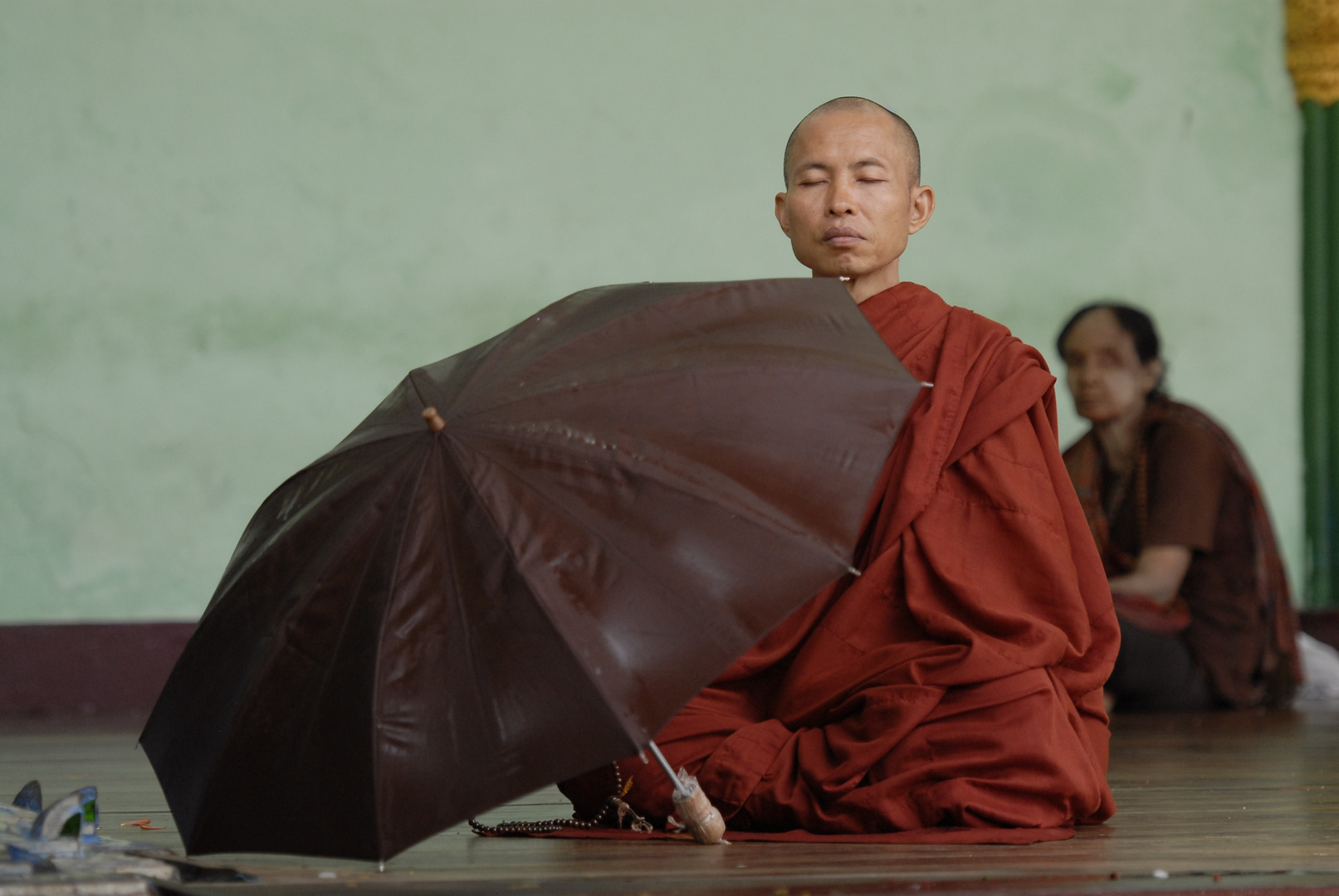 Monk with Umbrella