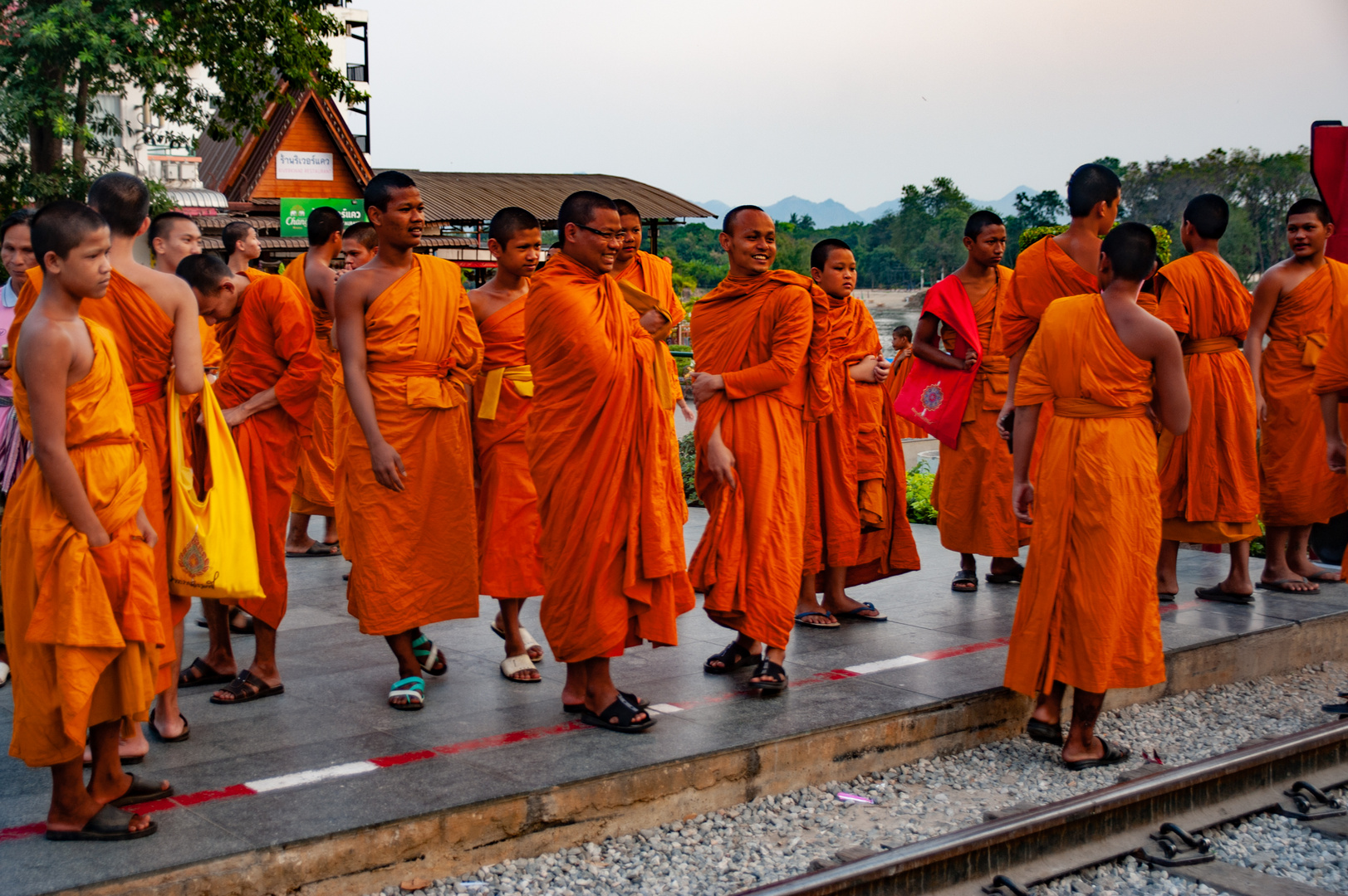 Monks as tourists at the bridge over the River Kwai