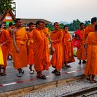Monks as tourists at the bridge over the River Kwai