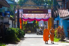 Monks enter a temple complex in Mae Sariang