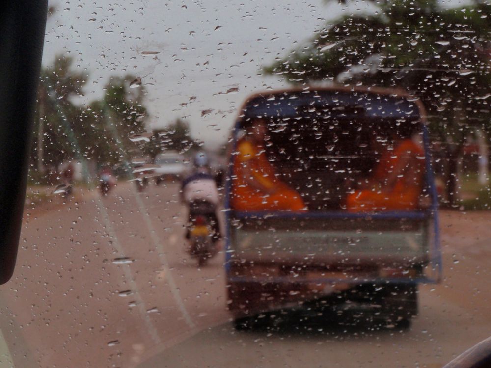 monks in the rain