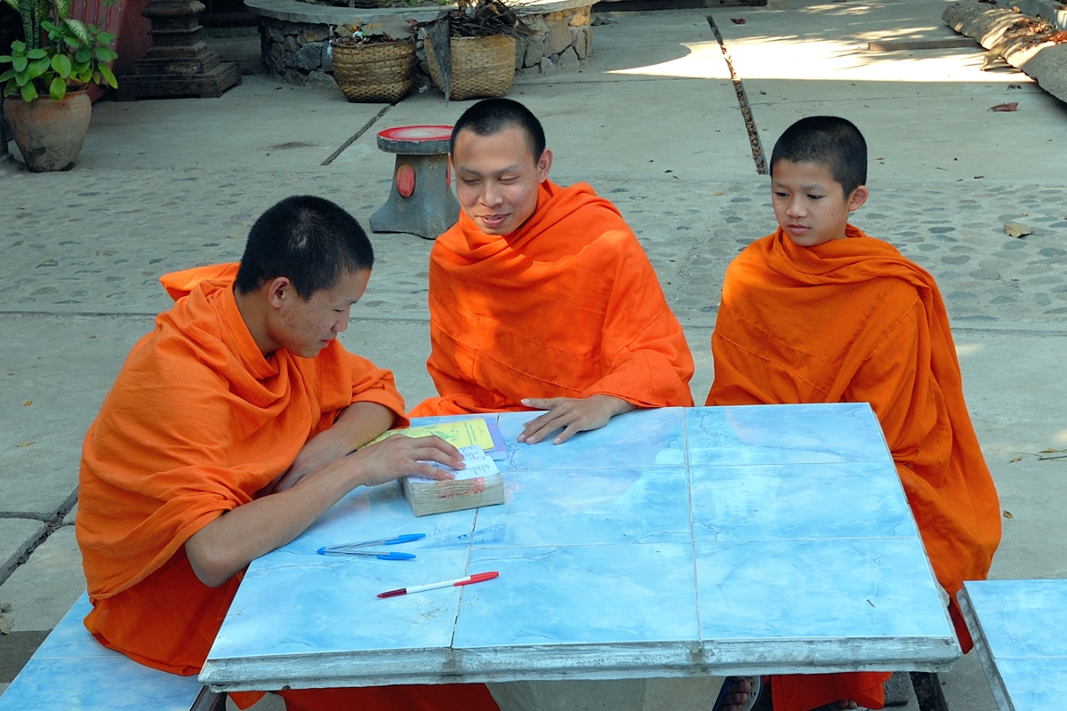 Monks in Wat Xieng Thong