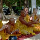 Monks on the beach Wat Na PhraLan