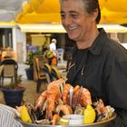 Monsieur serviert Seafood in Calvi