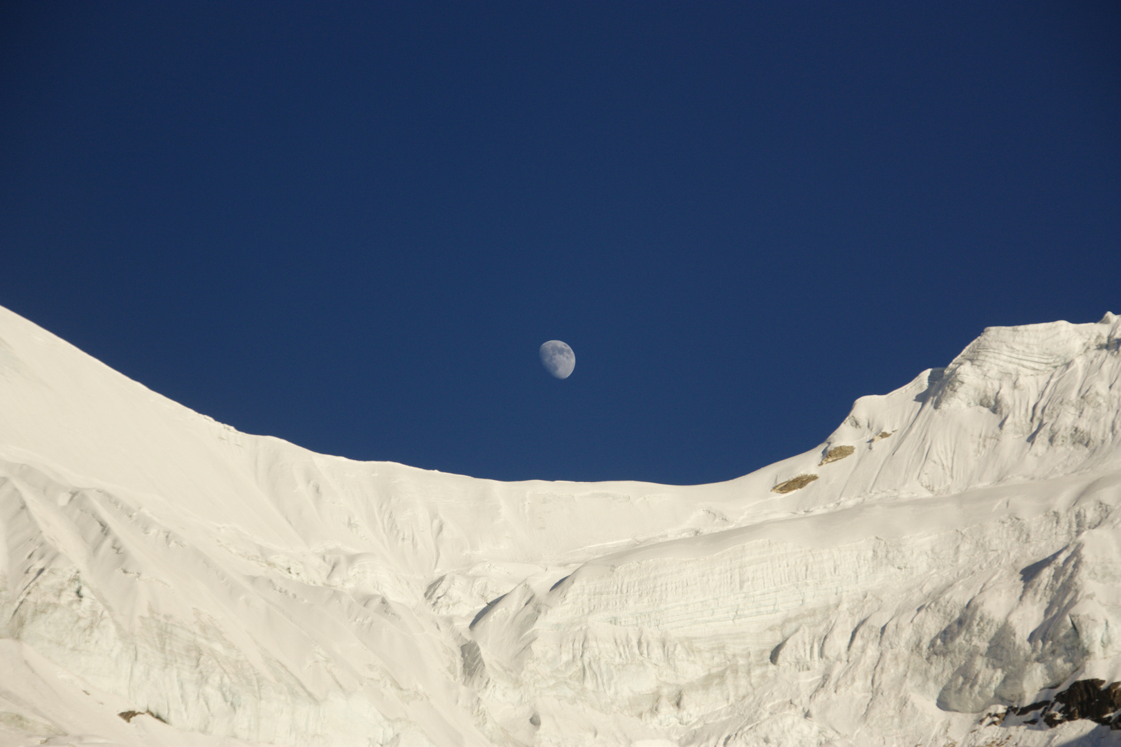 Moon above the mountain