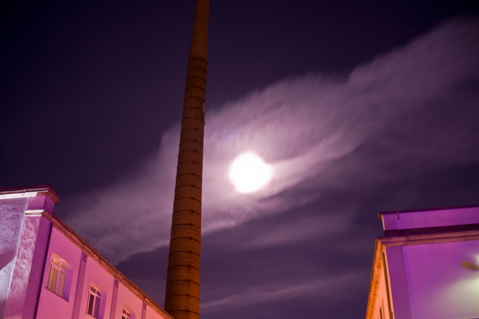 Moon behind clouds