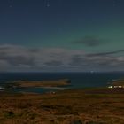 moonlit sky with faint northern lights