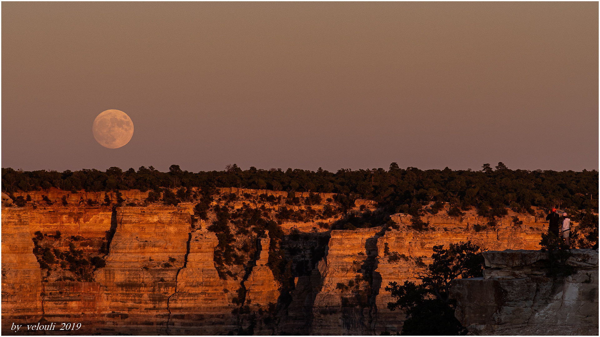 moonrise by sunset over the grand canyon