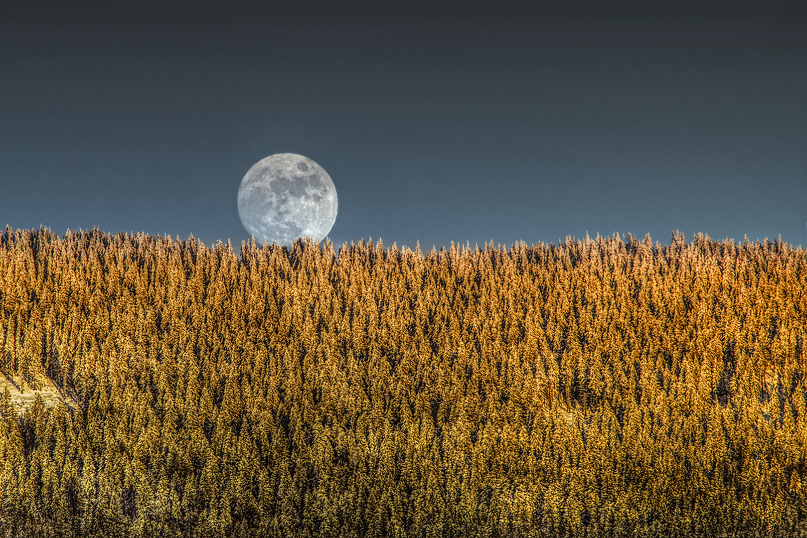 Moonrise during sunset