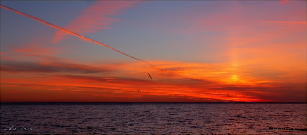 Morgendämmerung am Meer