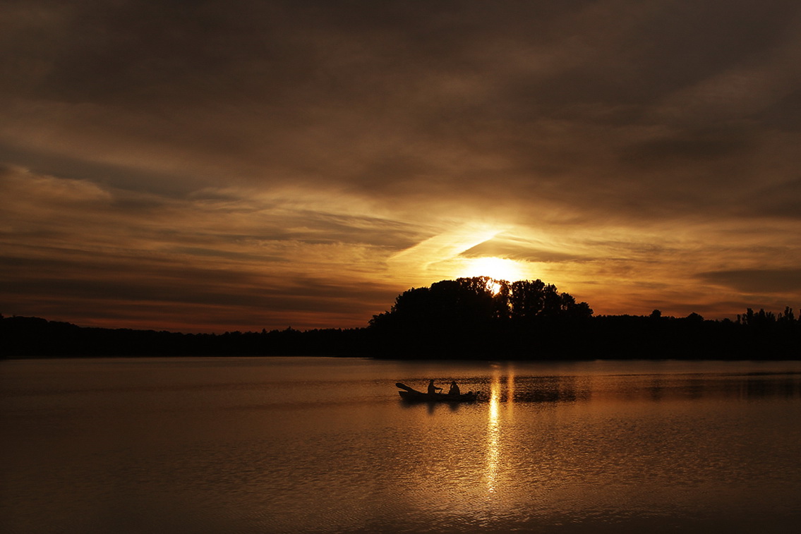 Morgendämmerung am See