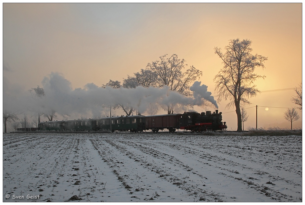 Morgennebel und aufgehende Wintersonne in Posewald