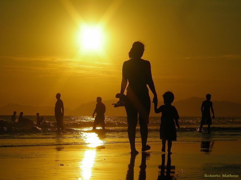 Mother and Son walking to the Sun. / Series: Life in Rio.