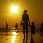 Mother and Son walking to the Sun. / Series: Life in Rio.