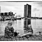 Mother & Son discussion on the waterfront