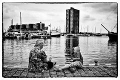 Mother & Son discussion on the waterfront