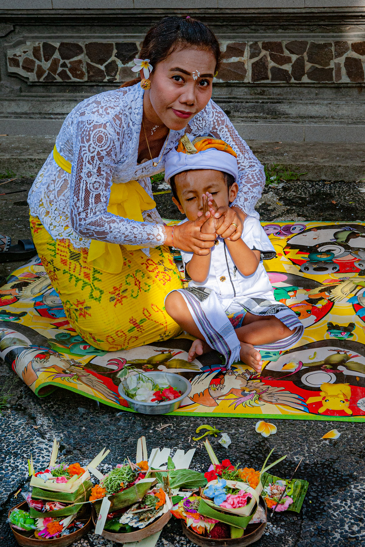 Mother teaching her son