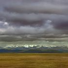 Mountain range under heavy clouds