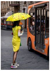 Mrs. Yellow under the gaze of passenger bus