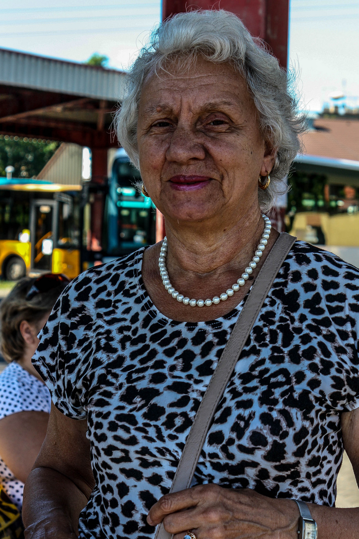 Ms. Poloczek is waiting for the Bus