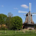 Mühle mit Schäfchenwolke in Norddeutschland 