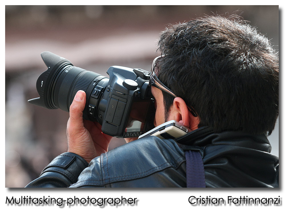 Multitasking Photographer