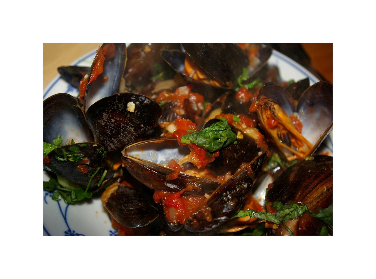 Muscheln in Tomatensauce (frz. Moules sauce tomate')