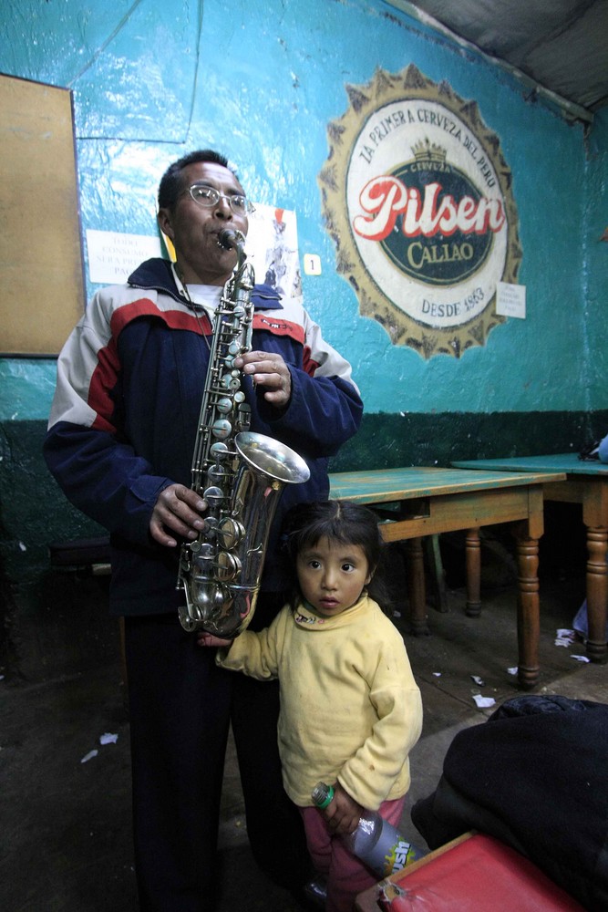 Musico con su hija