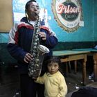 Musico con su hija