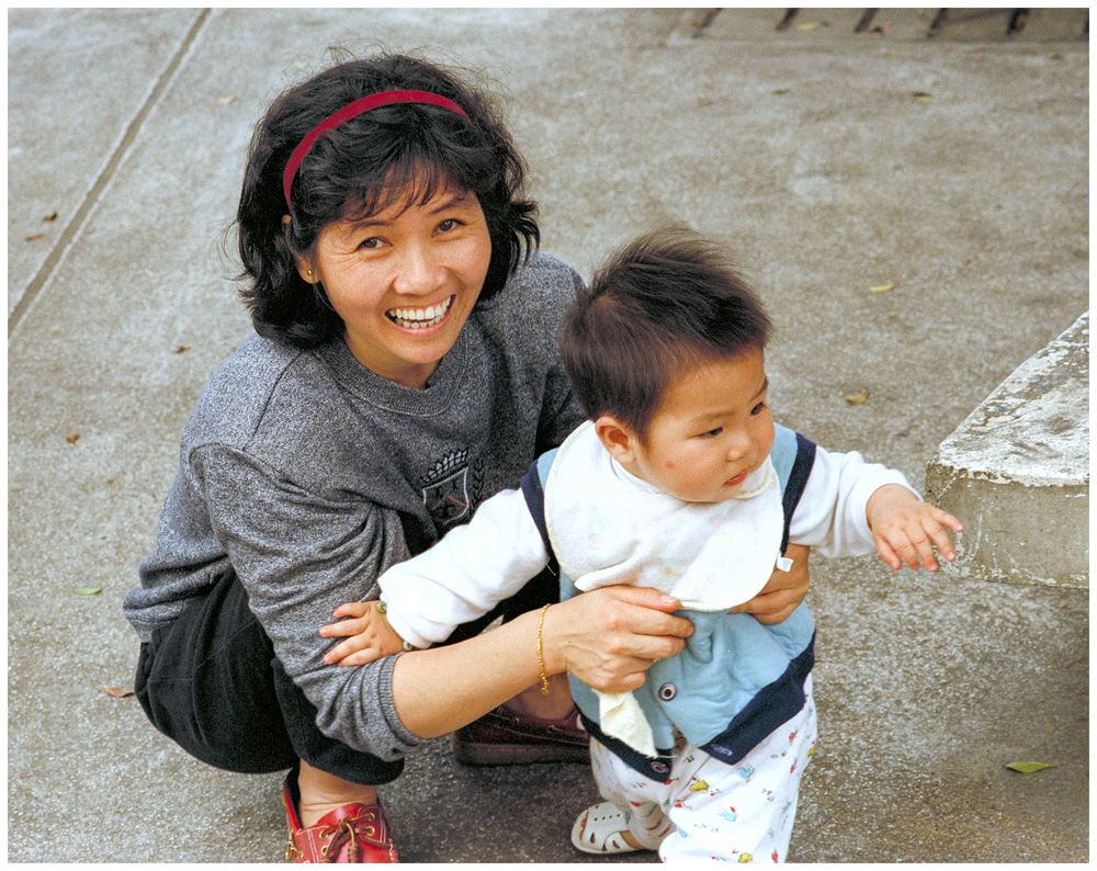 Mutter mit Kind in Hong Kong