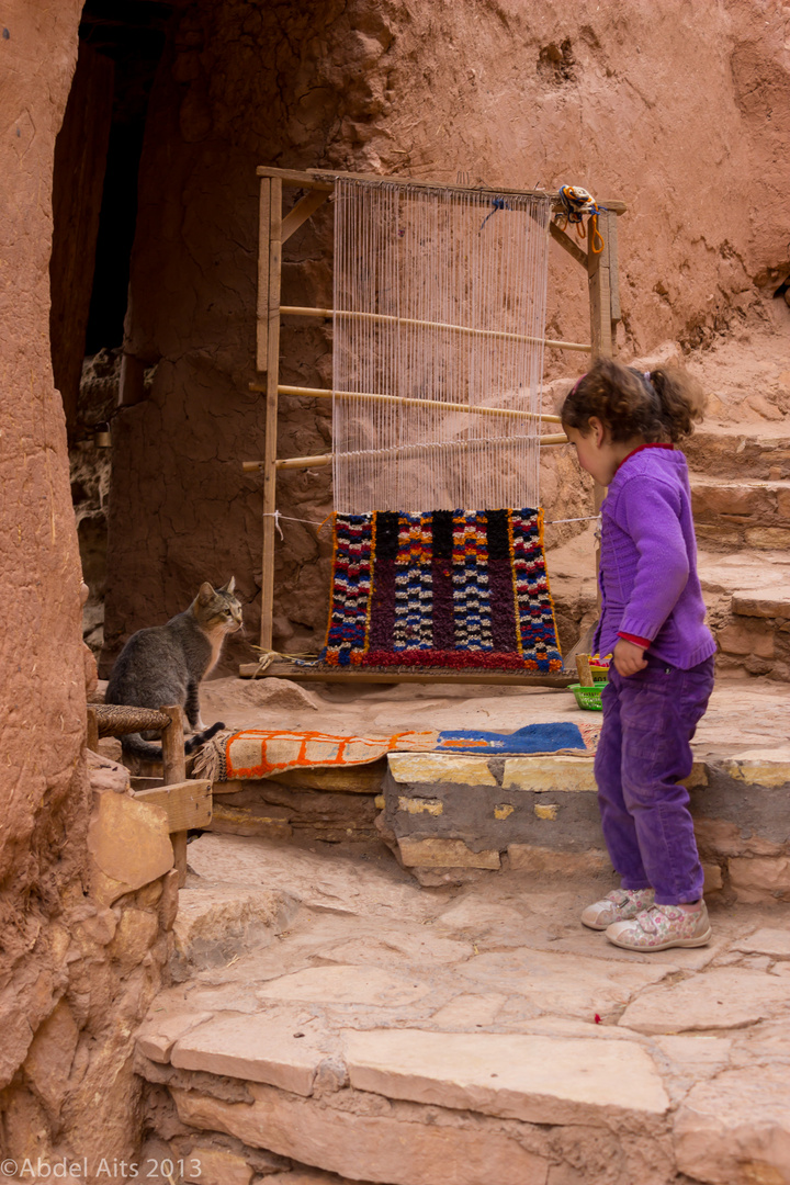 My Niece, the cat and the Rug Weaver