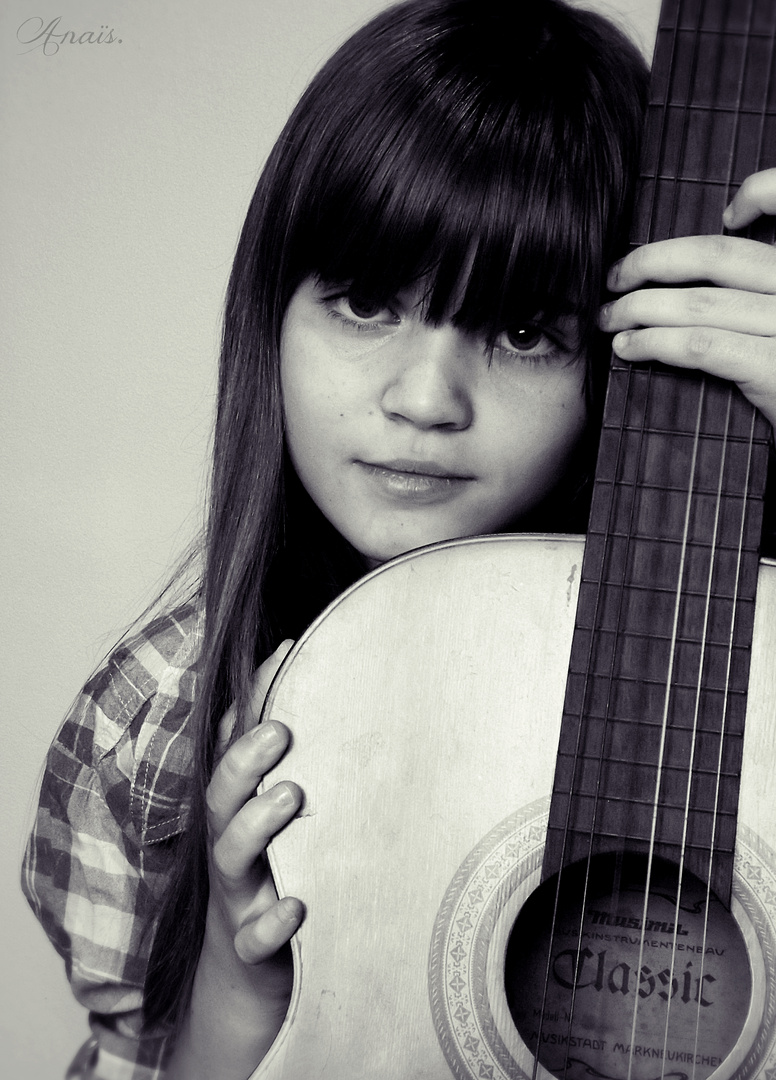 My sister and her guitar..