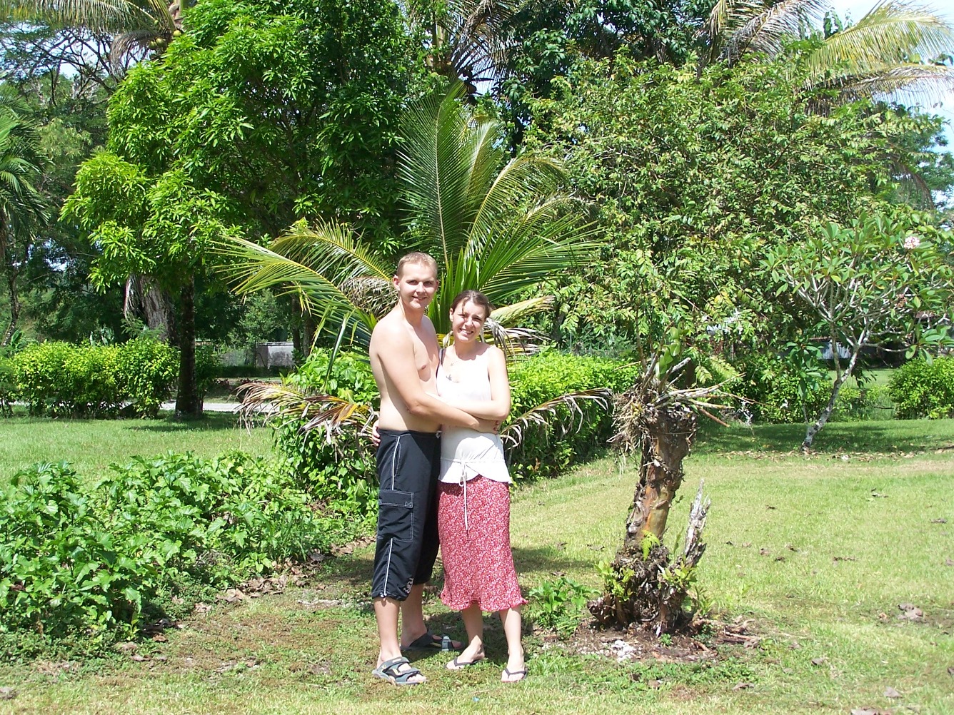 My wife and I at our planted Palm Tree