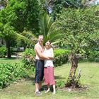 My wife and I at our planted Palm Tree