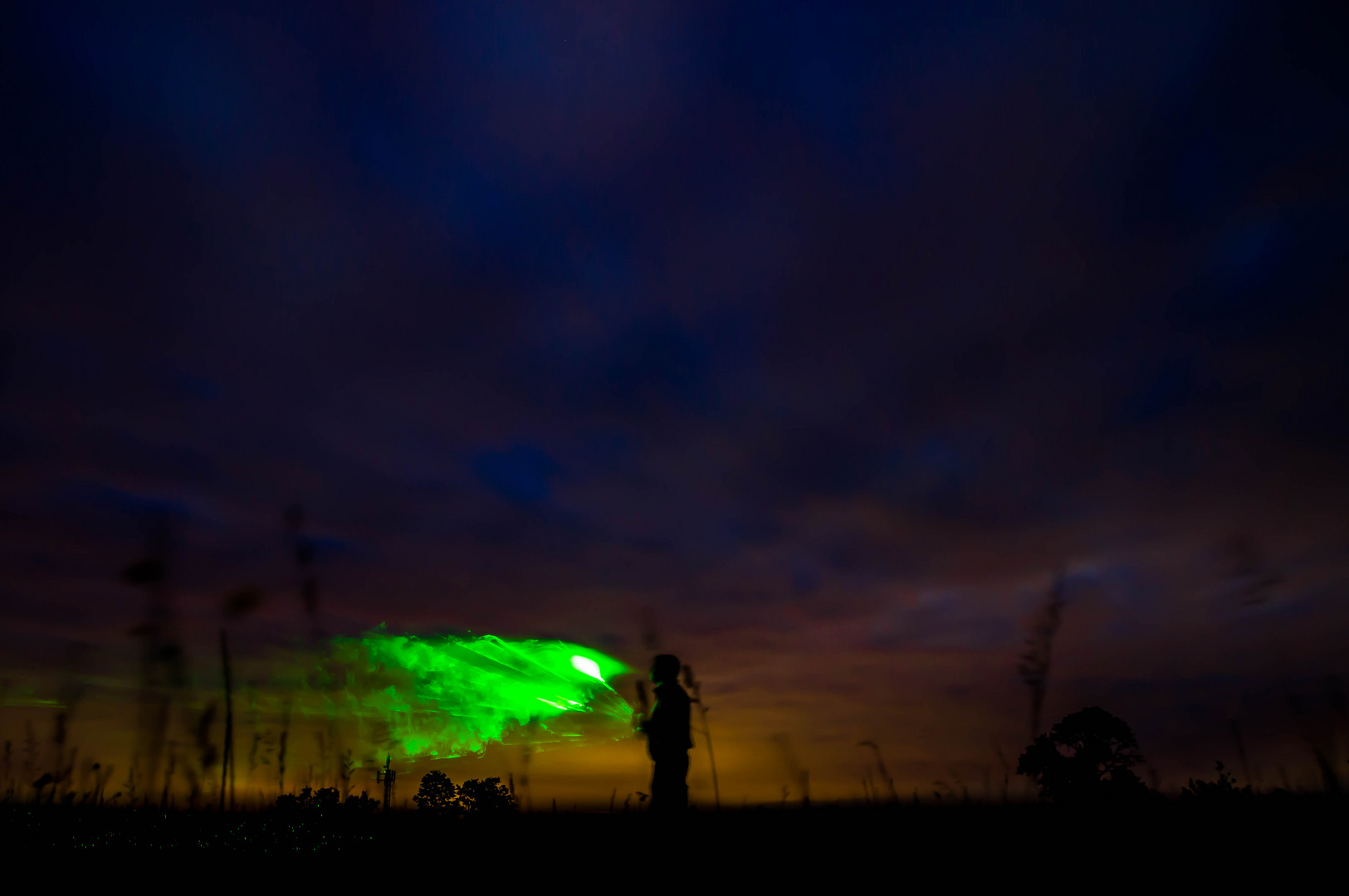 Nachts mit Laserpointer und Rauch